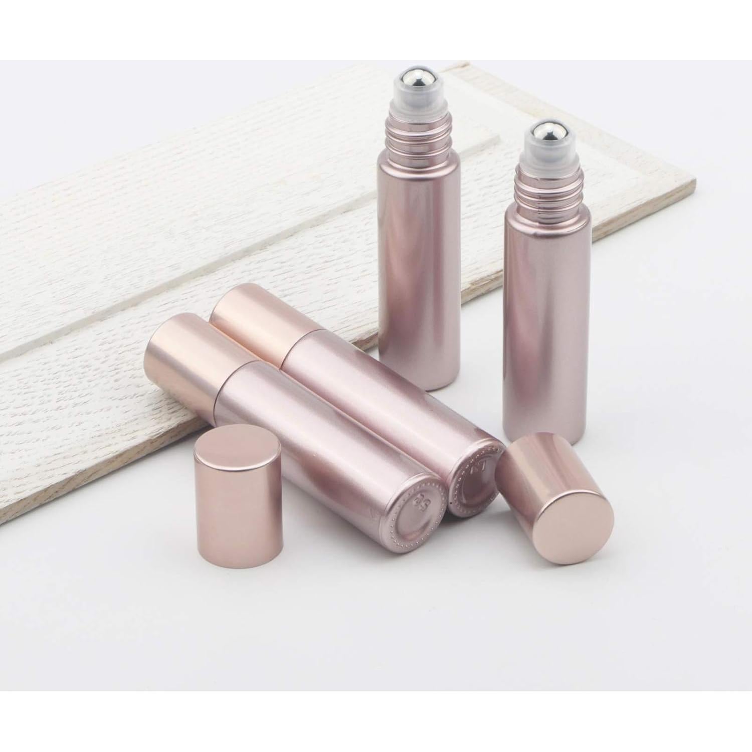 8 Botellas de Vidrio con Rodillo 10ml Newzoll Rosa Oro Mate