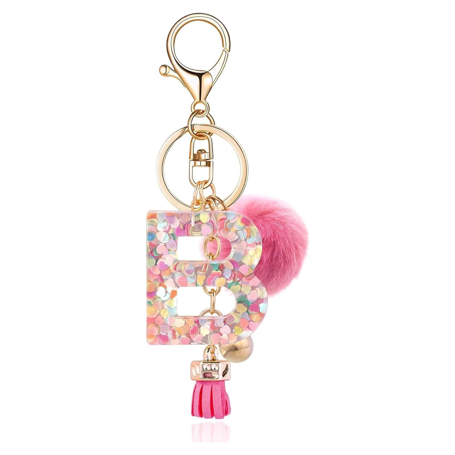 Llave de letra B de resina con bola de pelo rosa profundo