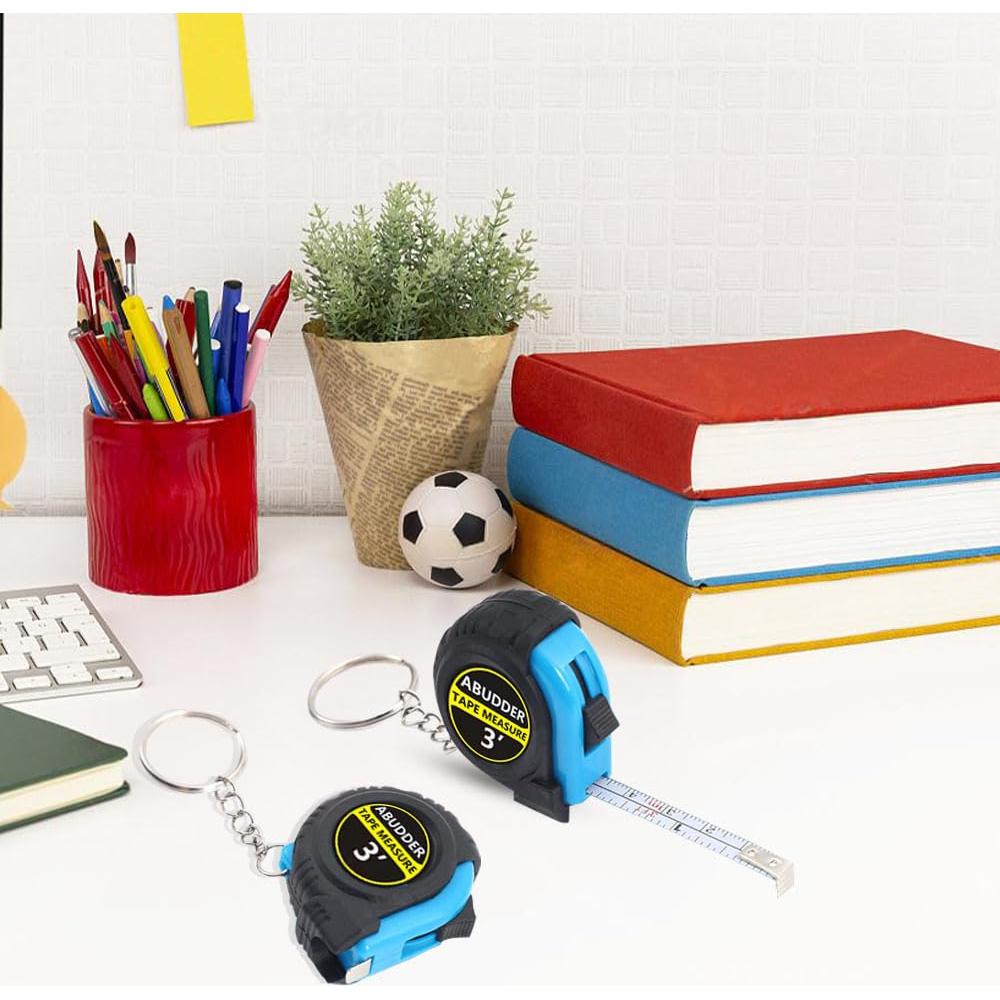 Paquete de 12 llaveros con cinta métrica retráctil 1m azul
