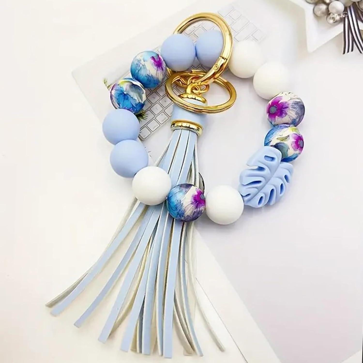 Llave de muñeca con cuentas de hoja Phamines azul