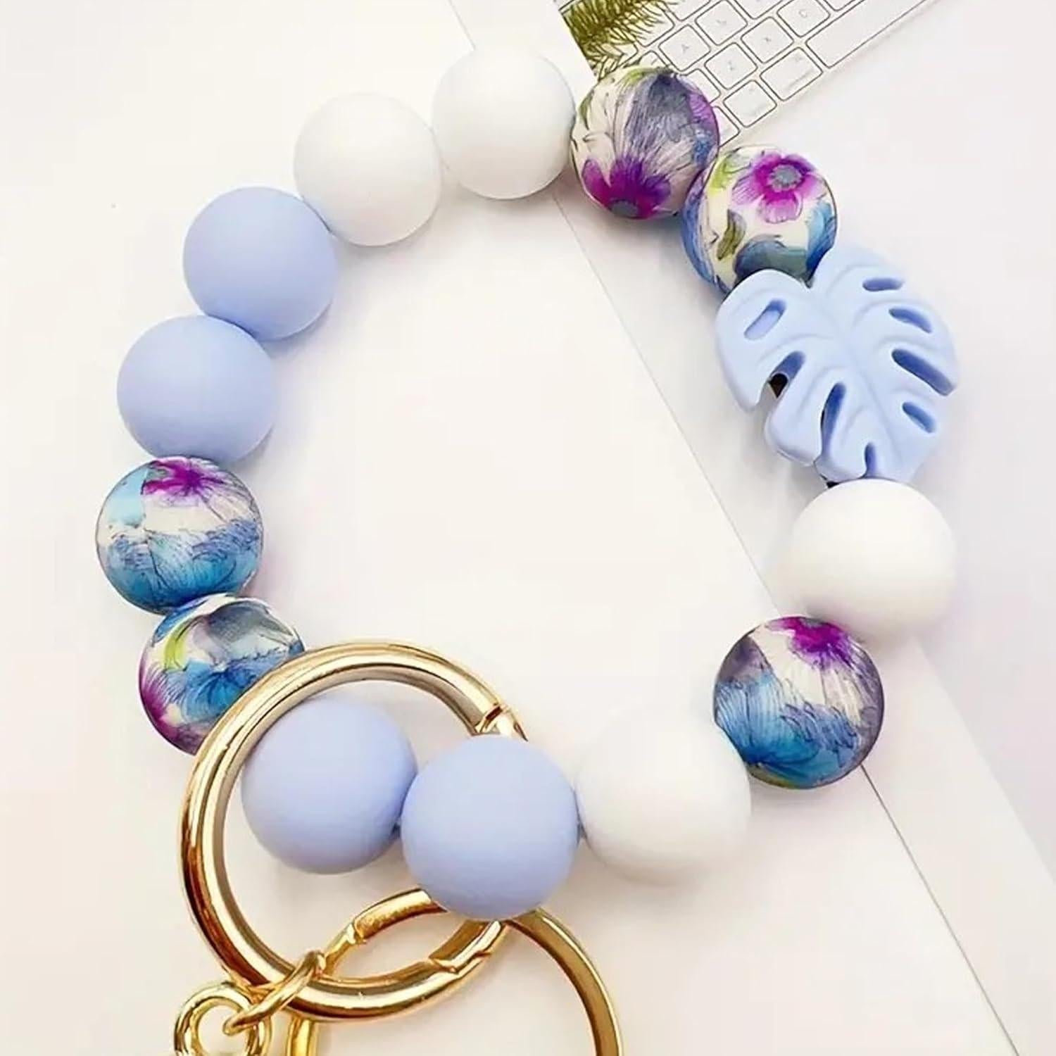 Llave de muñeca con cuentas de hoja Phamines azul