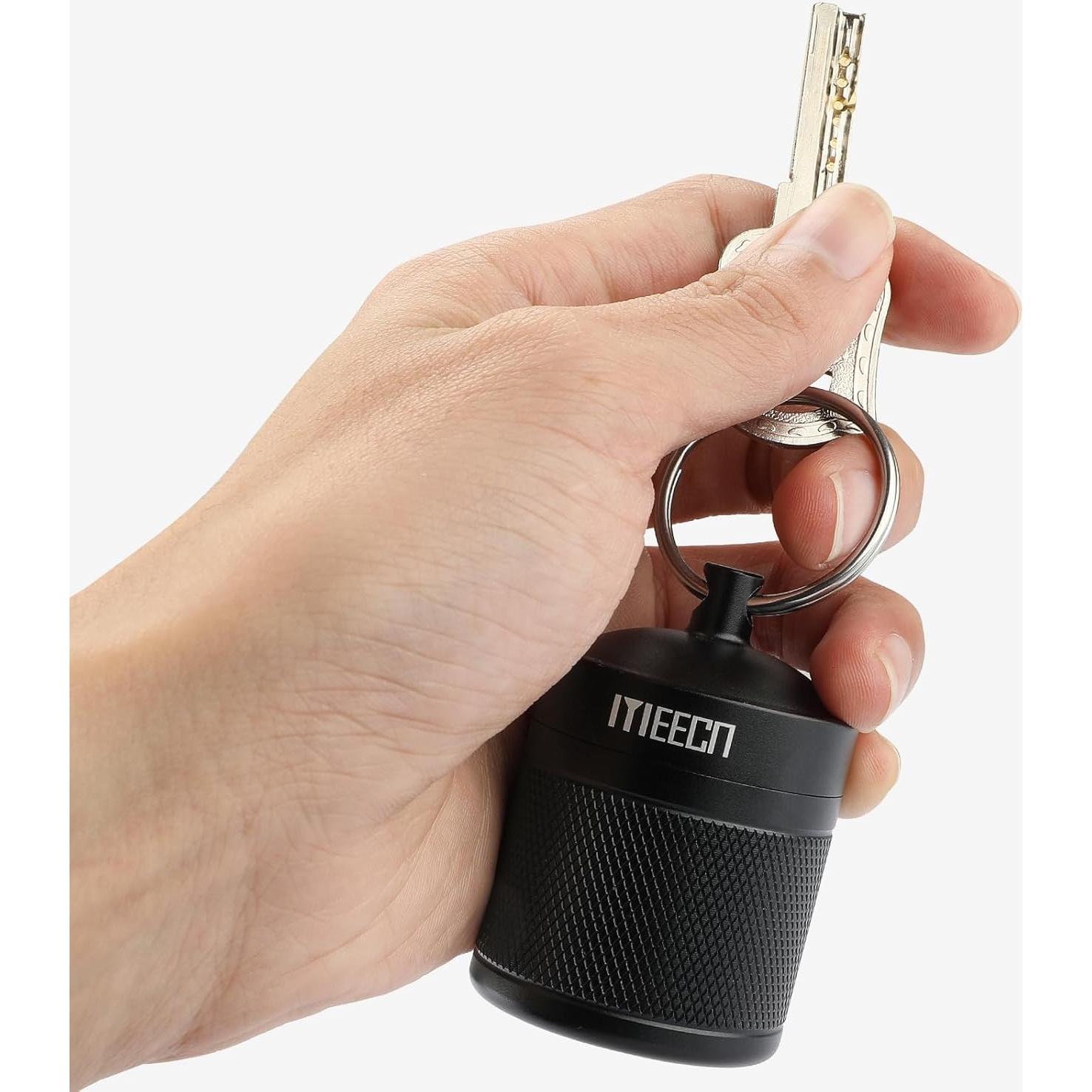 Portapíldoras llavero MEECN aluminio impermeable 1.6x5.08cm negro