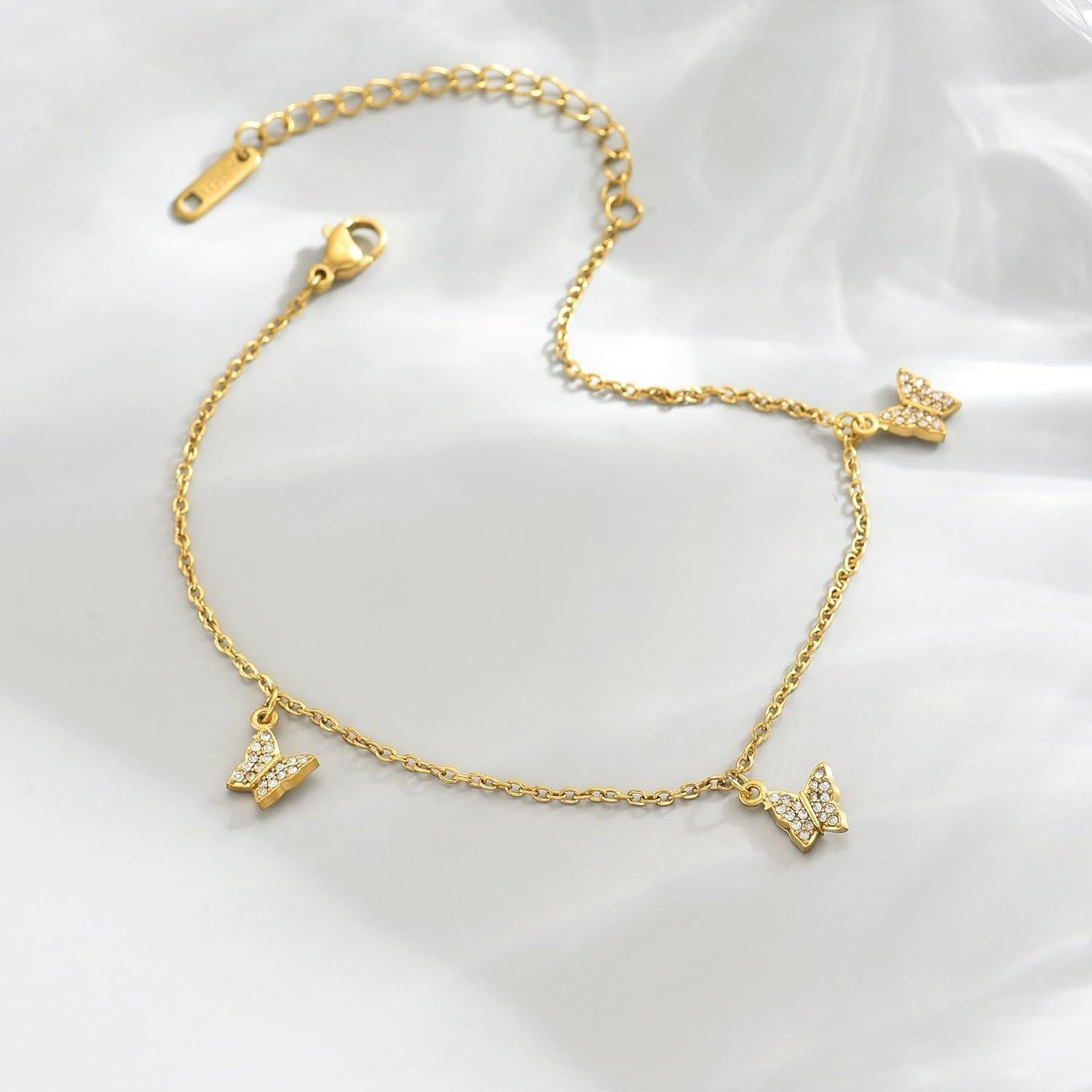 Tobillera de Oro 18K para Mujeres con Charm Mariposa y Delfín