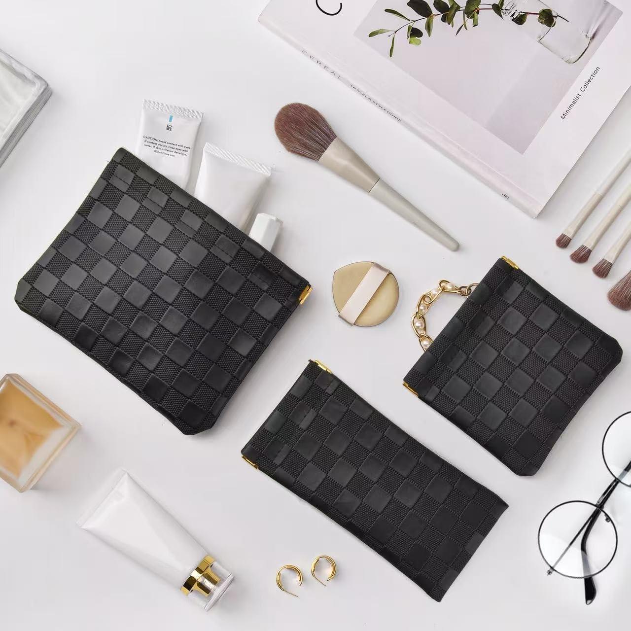 Juego de 3 Bolsas de Maquillaje Portátiles de Cuero Negro