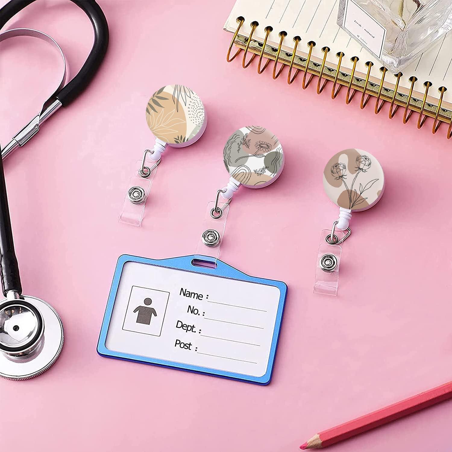 Porta Etiquetas Retráctil HEVITDA con Clip Cocodrilo - 3 Flores