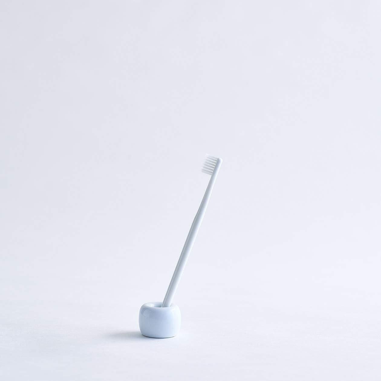 Soporte para cepillo de dientes Muji de porcelana blanca