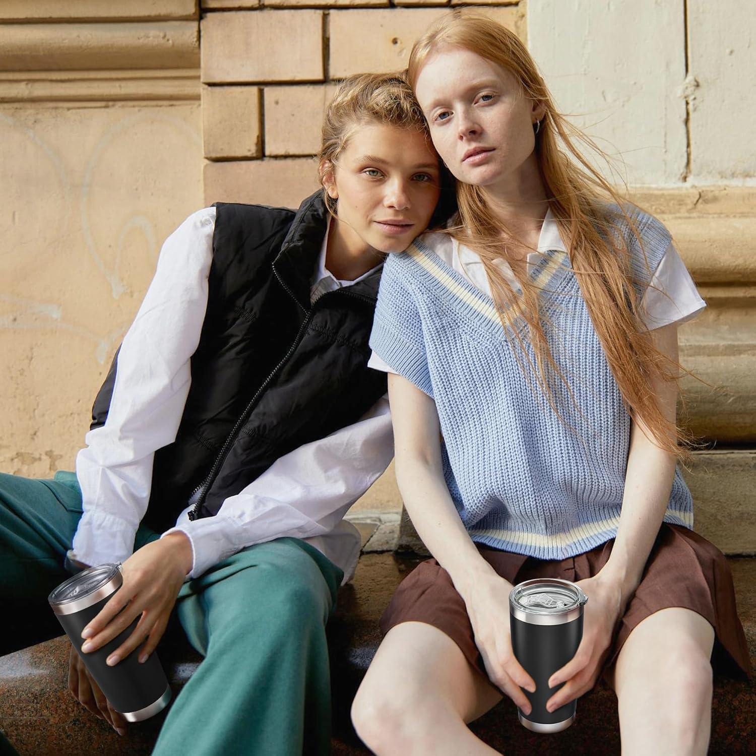 Taza de viaje Orebigo 20 oz acero inoxidable negro aislada