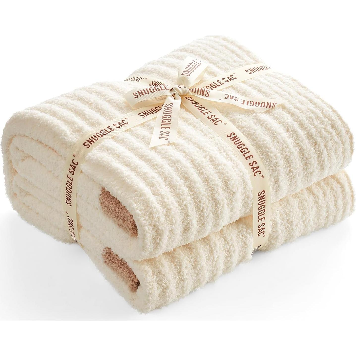 Manta de canalé Snuggle Sac crema 127x152 cm microfibra