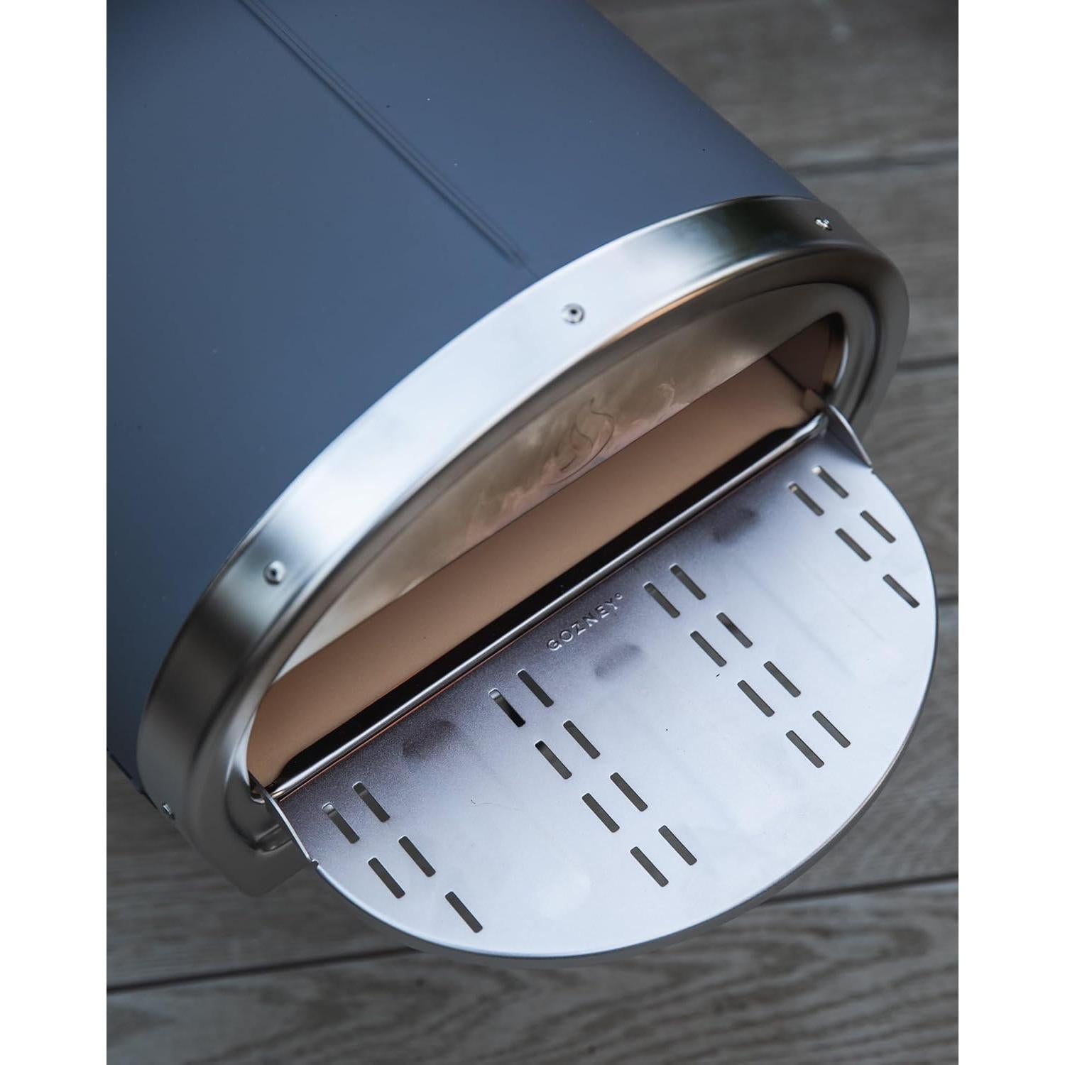 Manto Gozney Roccbox de acero inoxidable ventilado 30.99x15.24cm