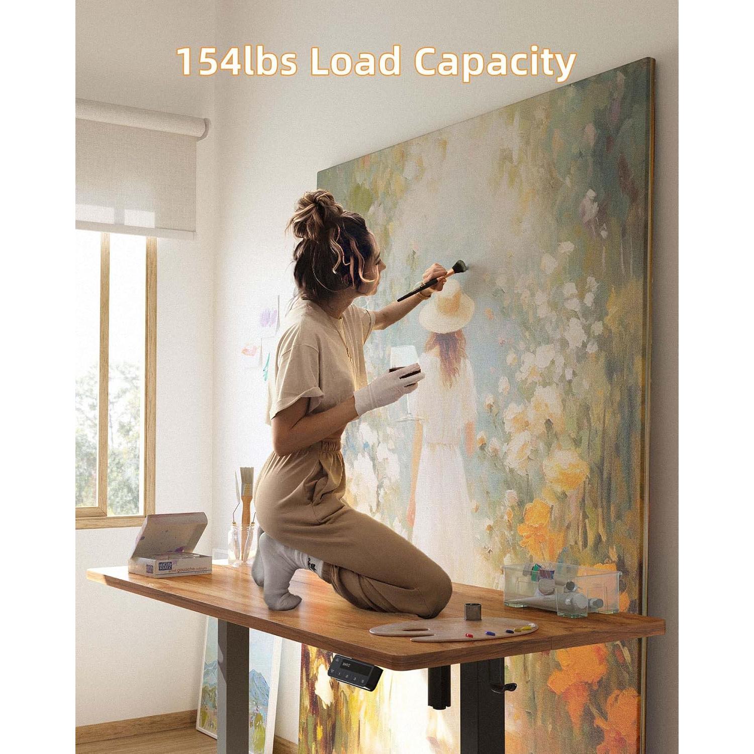 Escritorio de pie eléctrico YIHAYO 121.9x60.9 cm ajustable