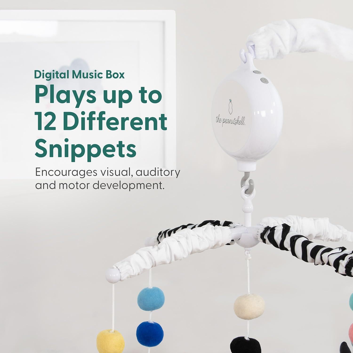 Móvil musical para cuna The Peanutshell, alto contraste