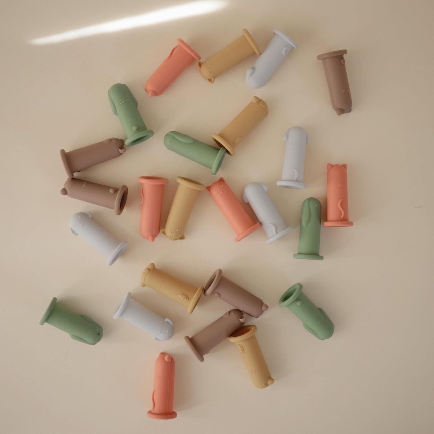 Títeres de dedo de silicona Mushie 5-pack para niños