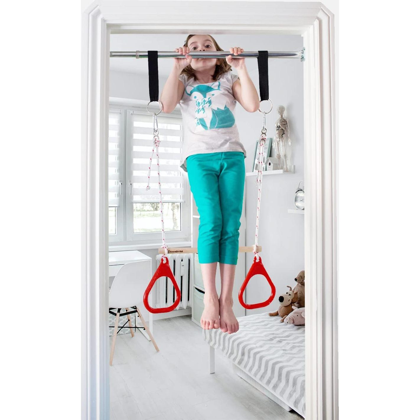 Columpio de Puerta DreamGYM con Barra de Trapecio y Anillos Rojos