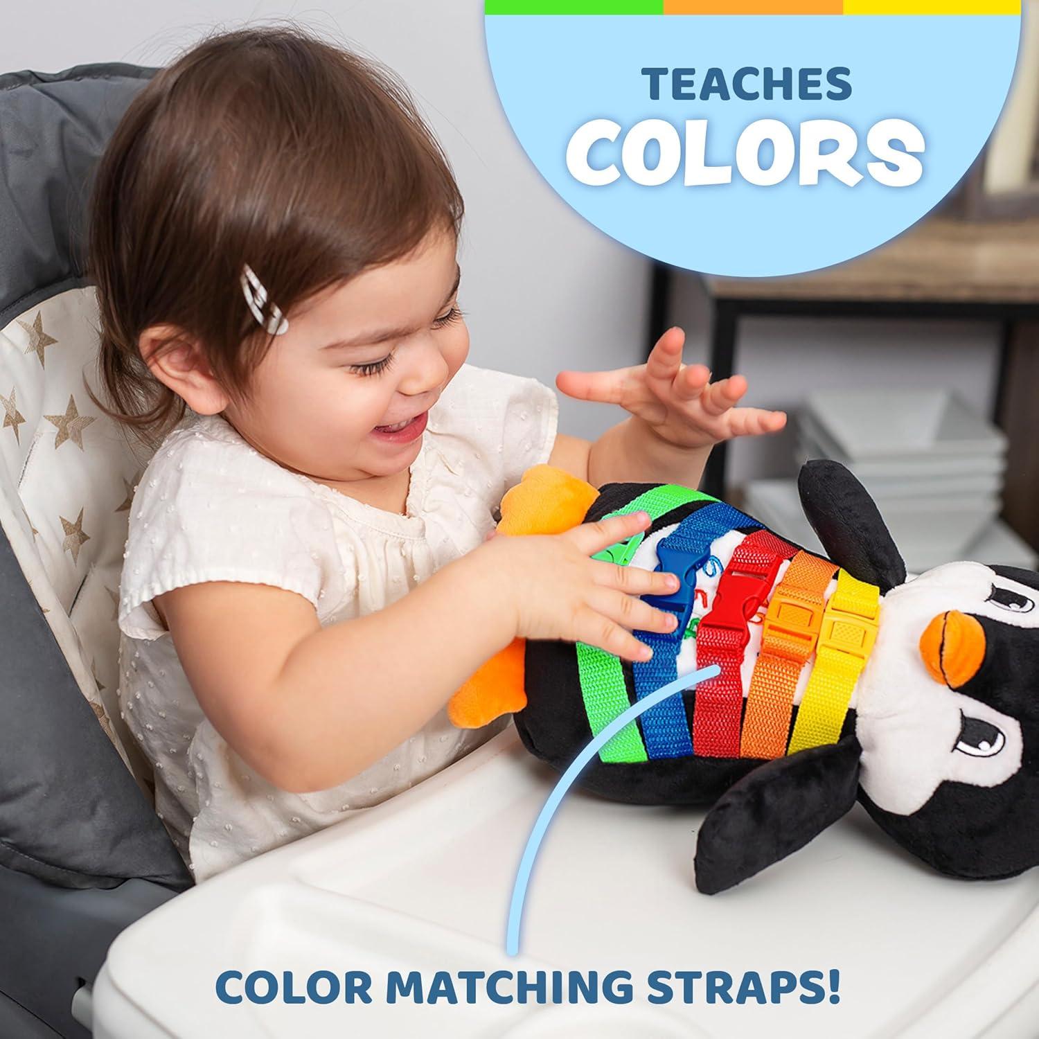 Juguete Sensorial Pingüino de Nieve Buckle Toy 28x15 cm