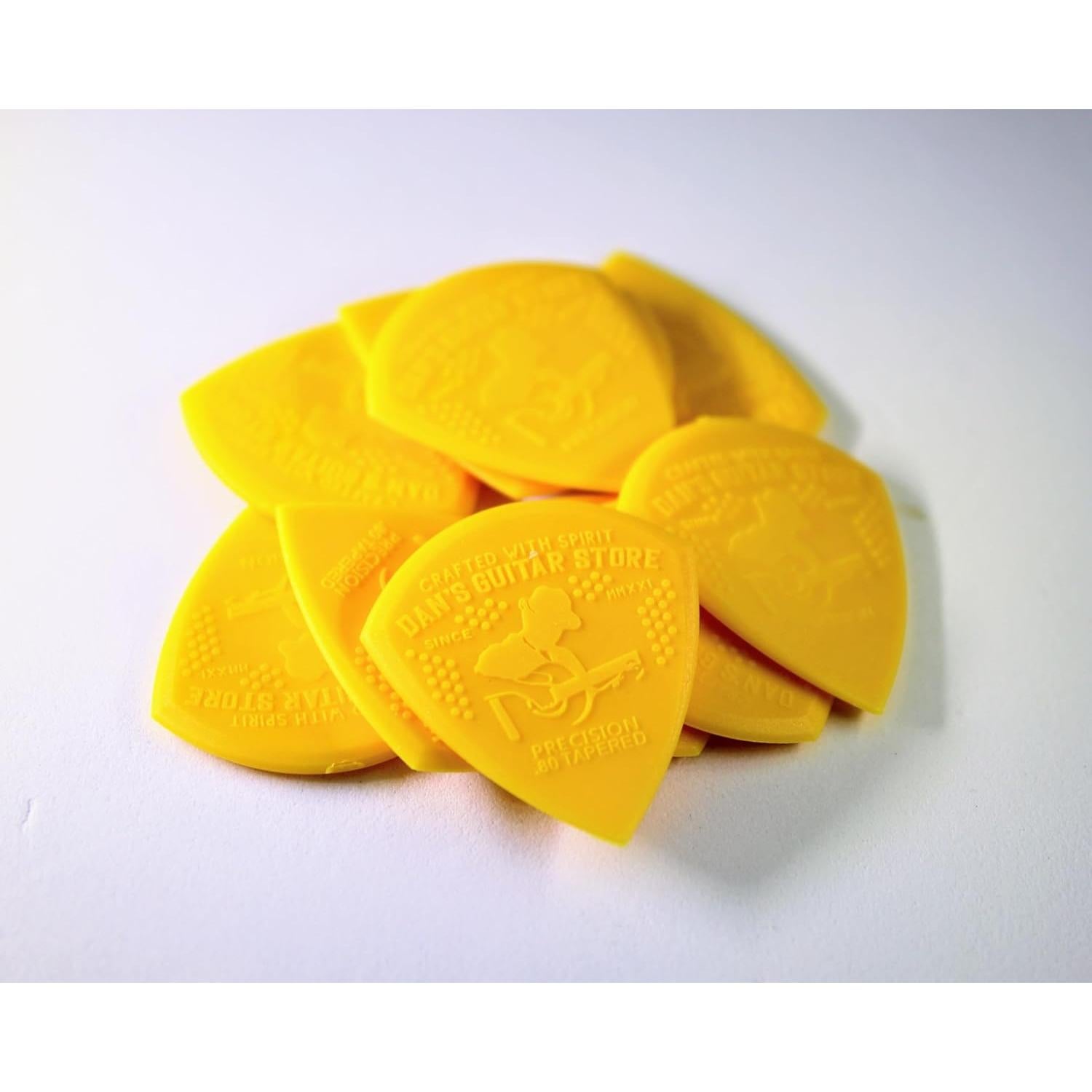 Paquete de 10 Púas de Guitarra Dan 0.80mm Nylon Amarillo