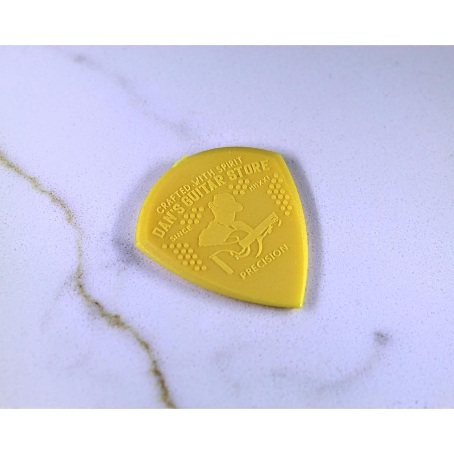 Paquete de 10 Púas de Guitarra Dan 0.80mm Nylon Amarillo
