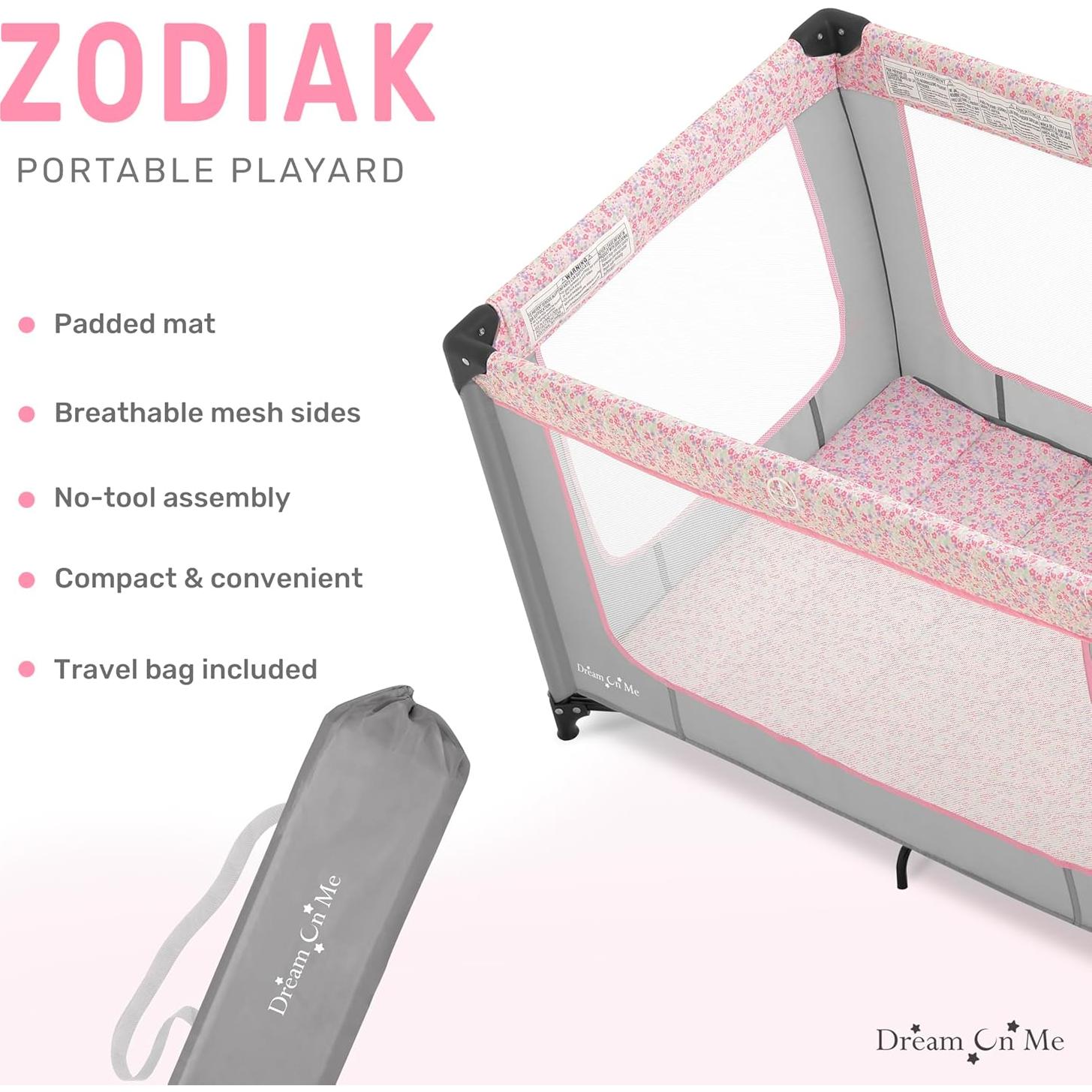Cuna Portátil Dream On Me Zodiak Gris y Rosa, Ligera y Plegable