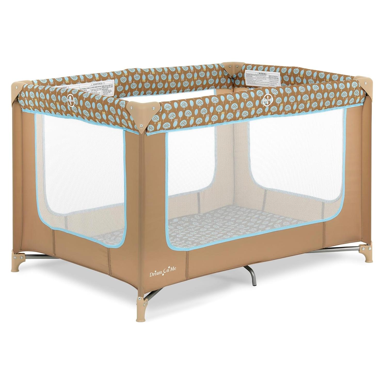 Cuna Portátil Dream On Me Zodiak Café/Azul, Ligera y Plegable