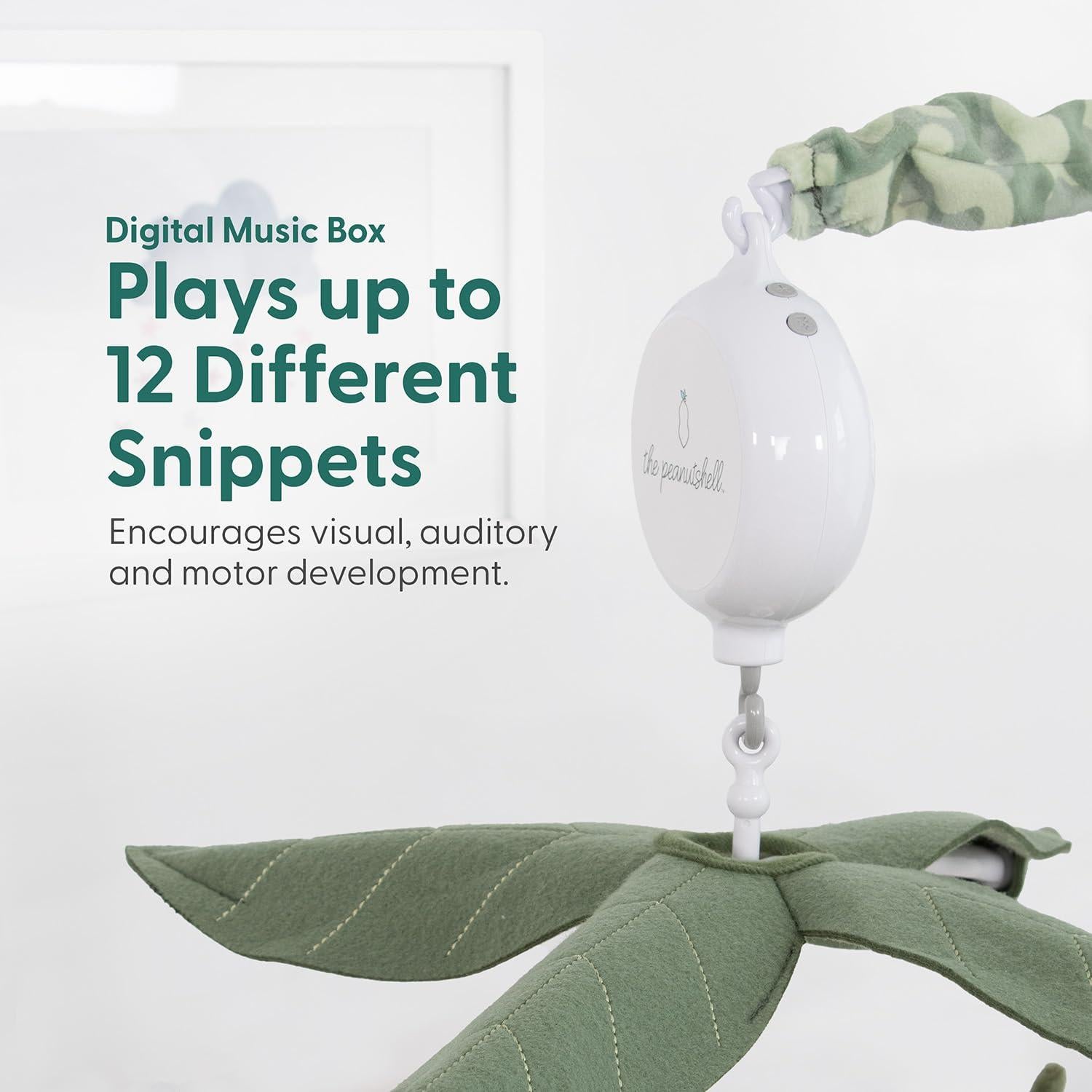 Móvil musical de cuna The Peanutshell dinosaurios camuflaje