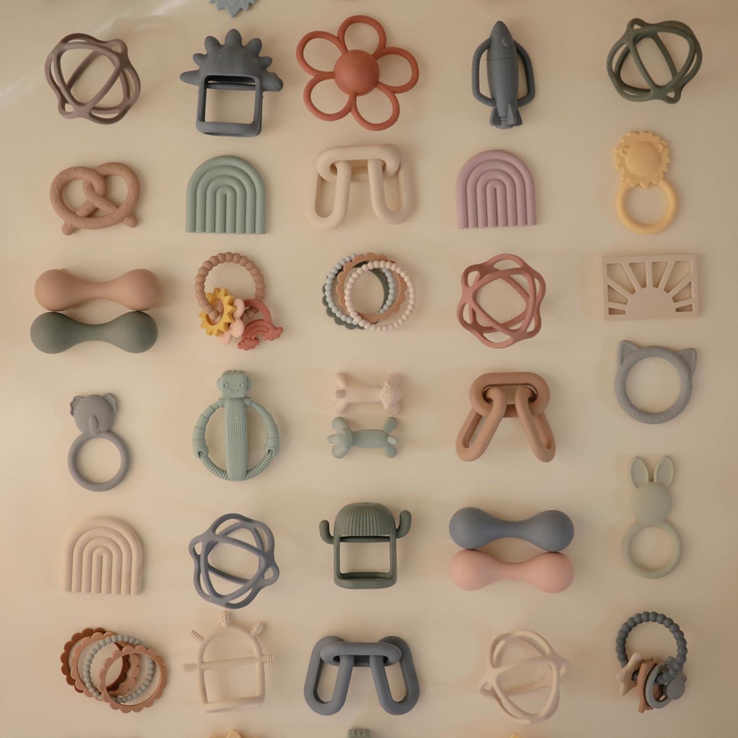 Mordedor y Sonajero de Silicona Mushie Margarita Lila Suave