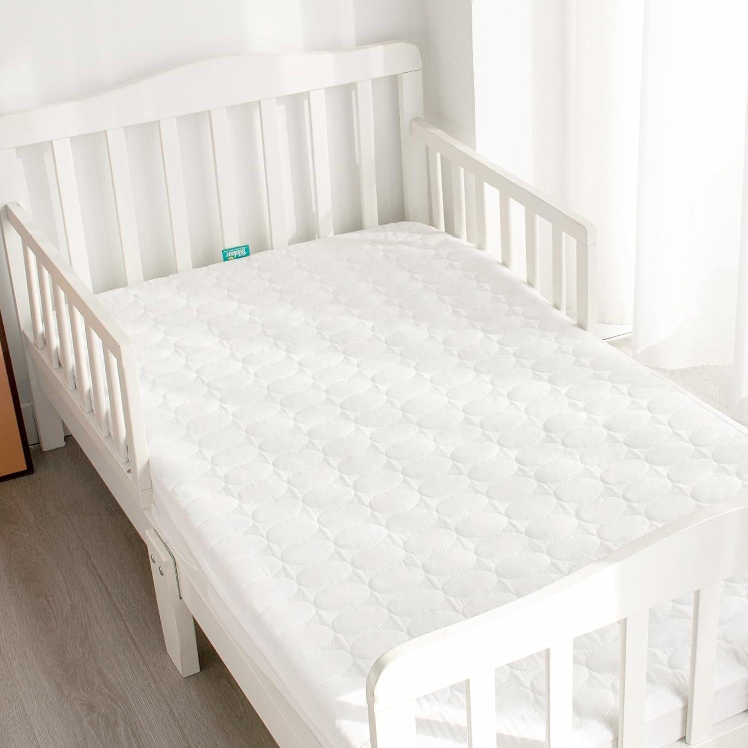 Protector de Colchón Impermeable Biloban para Cuna 132x71 cm
