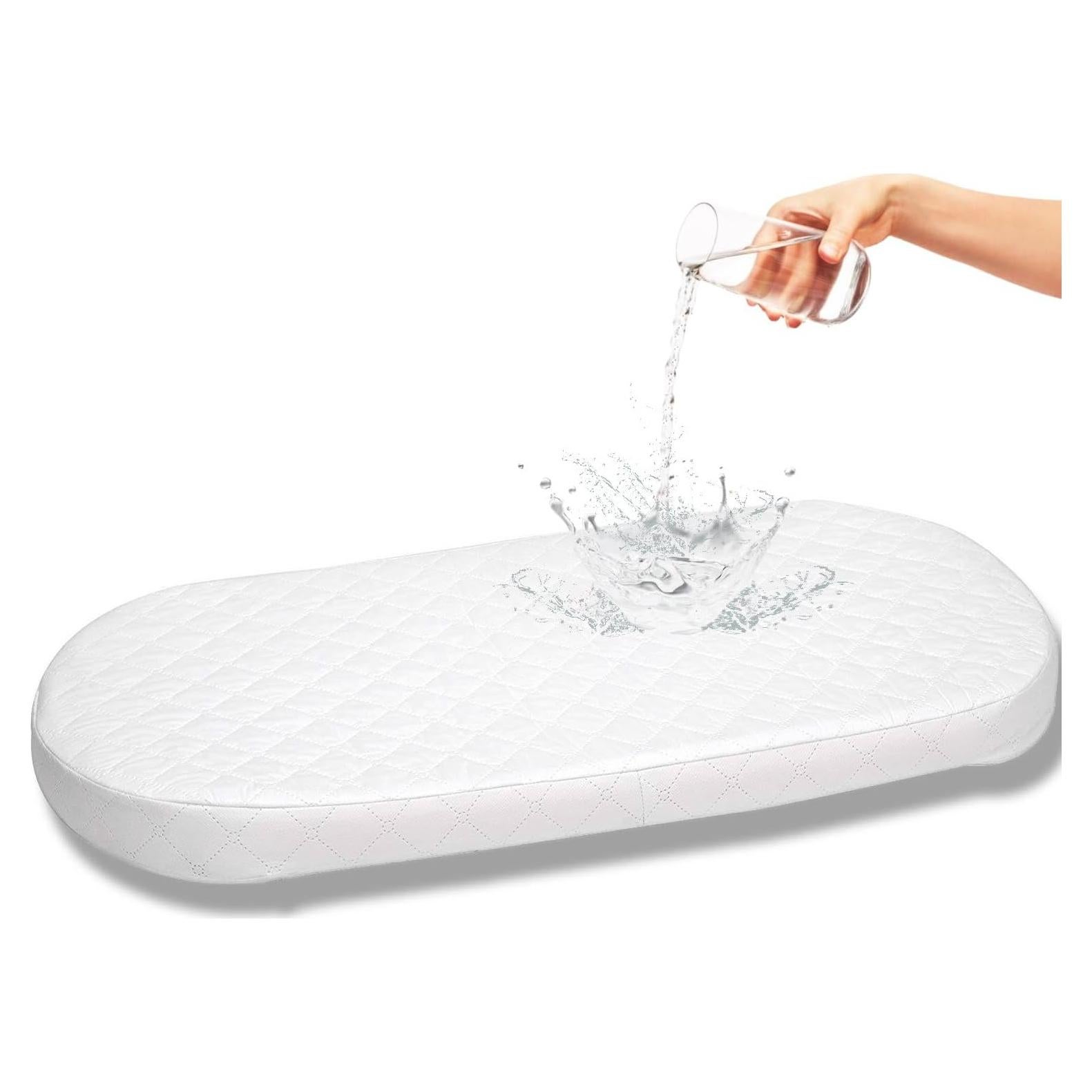 Almohadilla para cuna ovalada First Essentials 30.5x73.7 cm