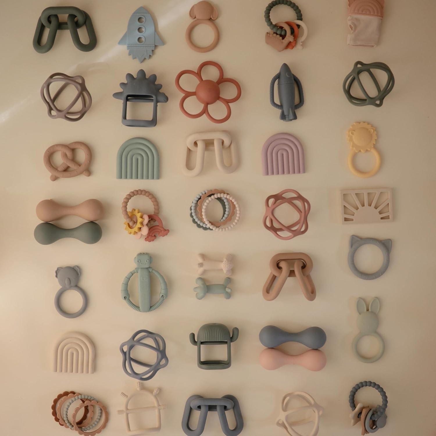 Mordedor de silicona Mushie Arcoíris Mauve 8.6 cm