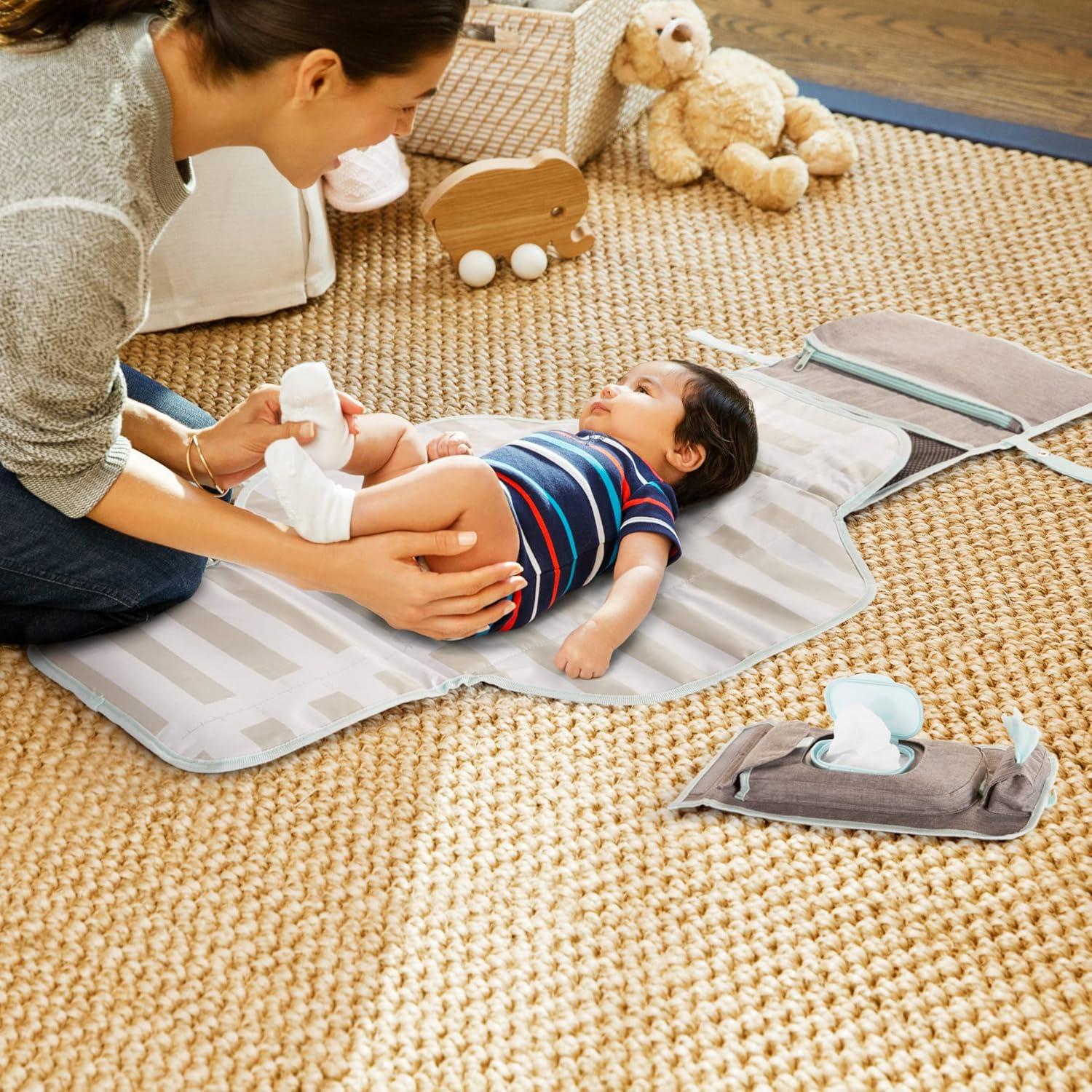 Almohadilla de Cambio Portátil Munchkin 71x56cm con 12 Bolsas