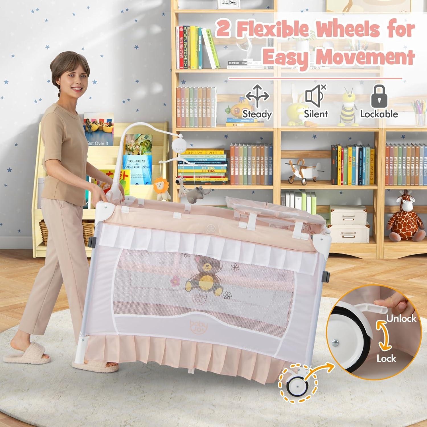 Cuna portátil 4 en 1 BABY JOY con dosel rosa y ruedas