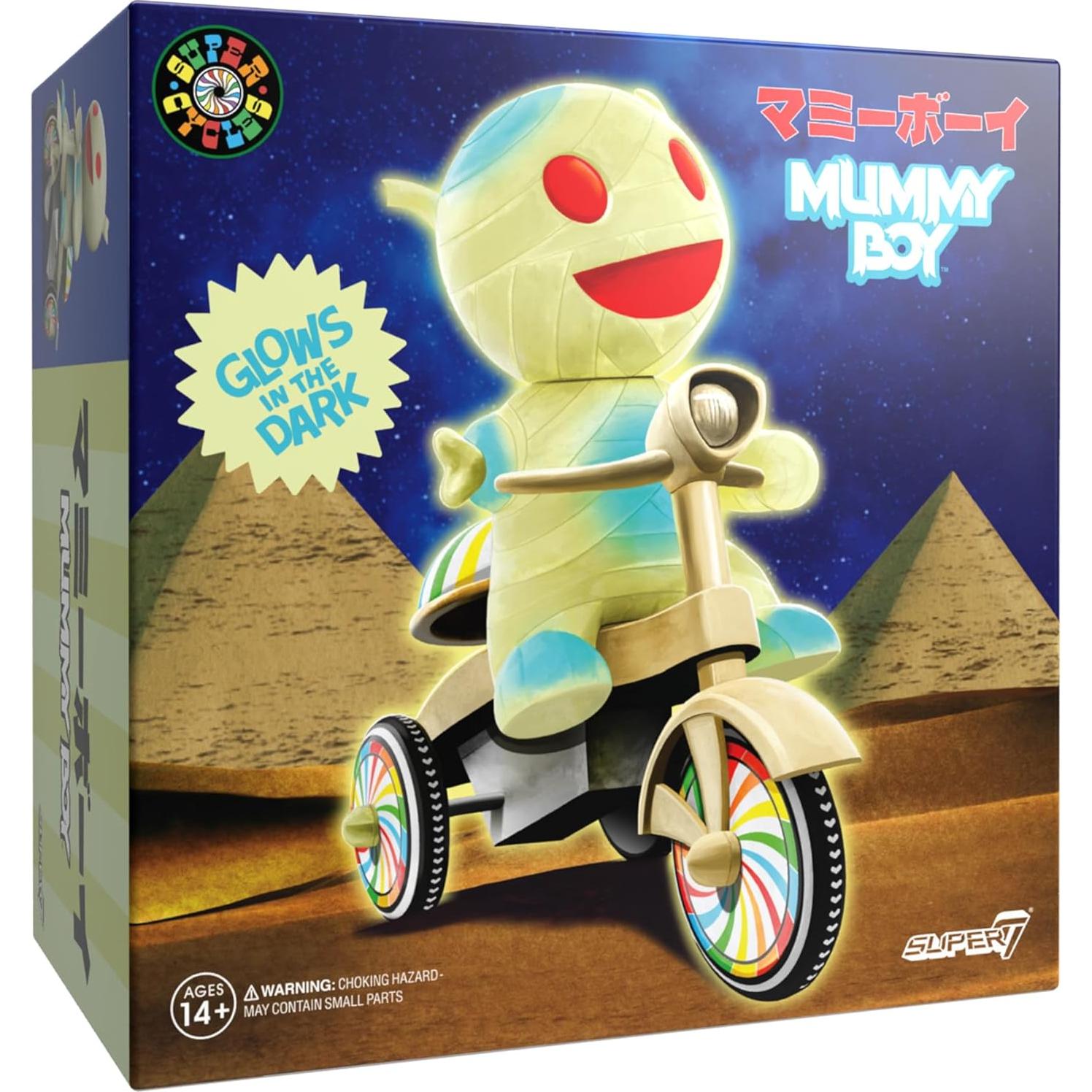 Figura de Acción Niña Momia Super7 con Triciclo Brillante 5"