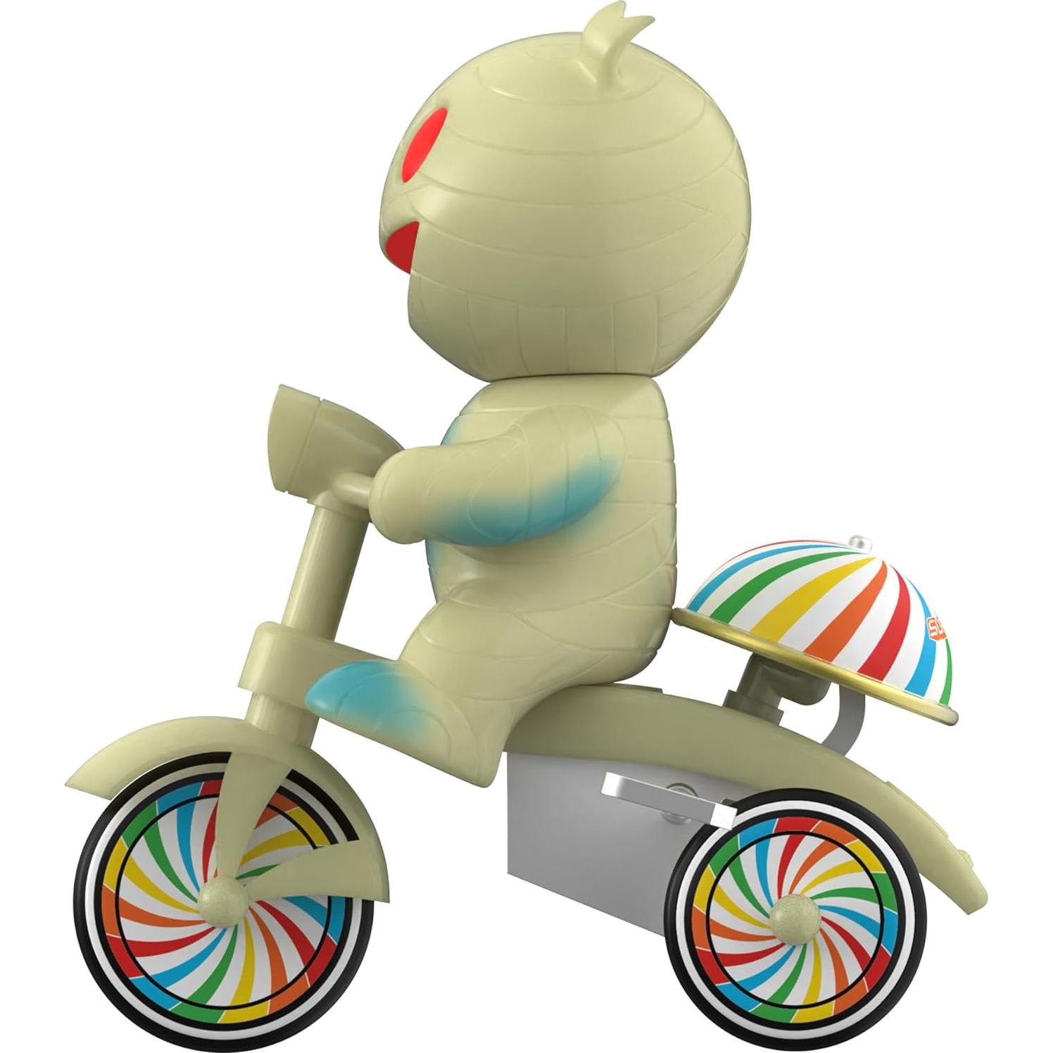 Figura de Acción Niña Momia Super7 con Triciclo Brillante 5"