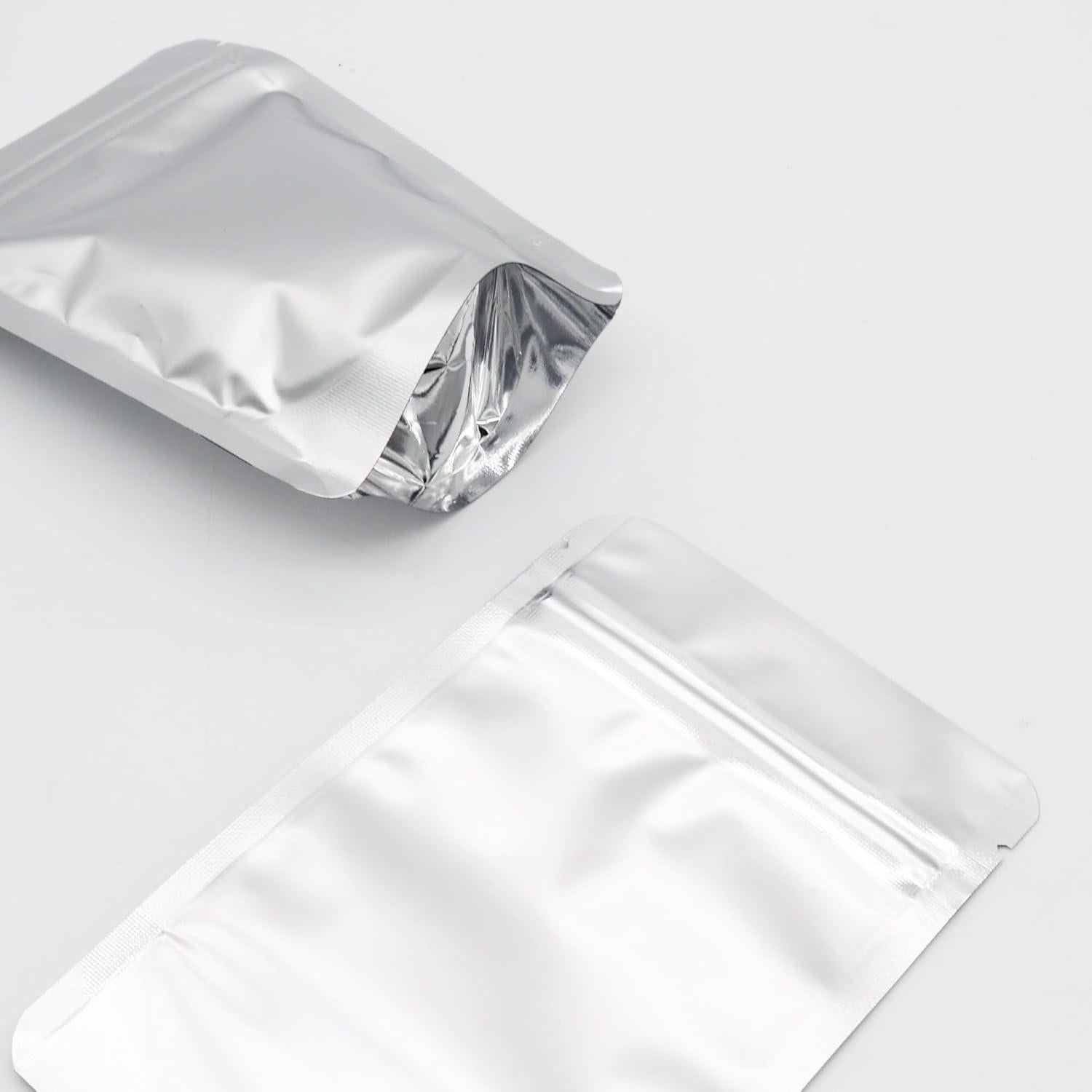 Bolsas Reutilizables 4CP 10.16x15.24 cm con Ventana Plateadas