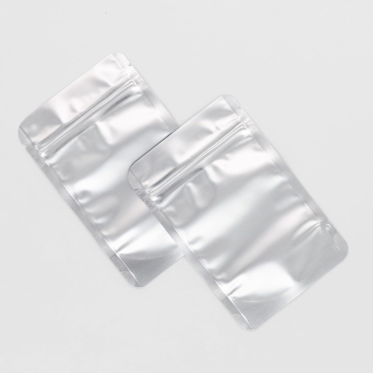 Bolsas Reutilizables 4CP 10.16x15.24 cm con Ventana Plateadas