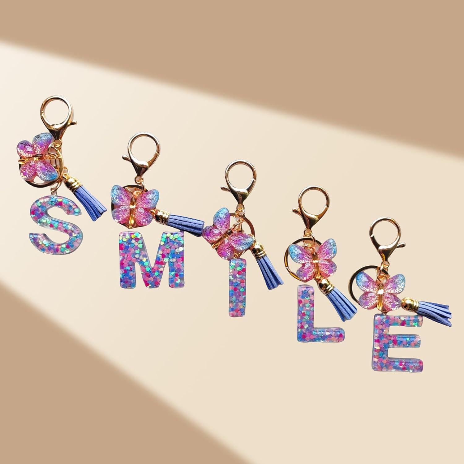 Llavero Inicial Personalizado con Borlas Mariposa Rosa y Verde