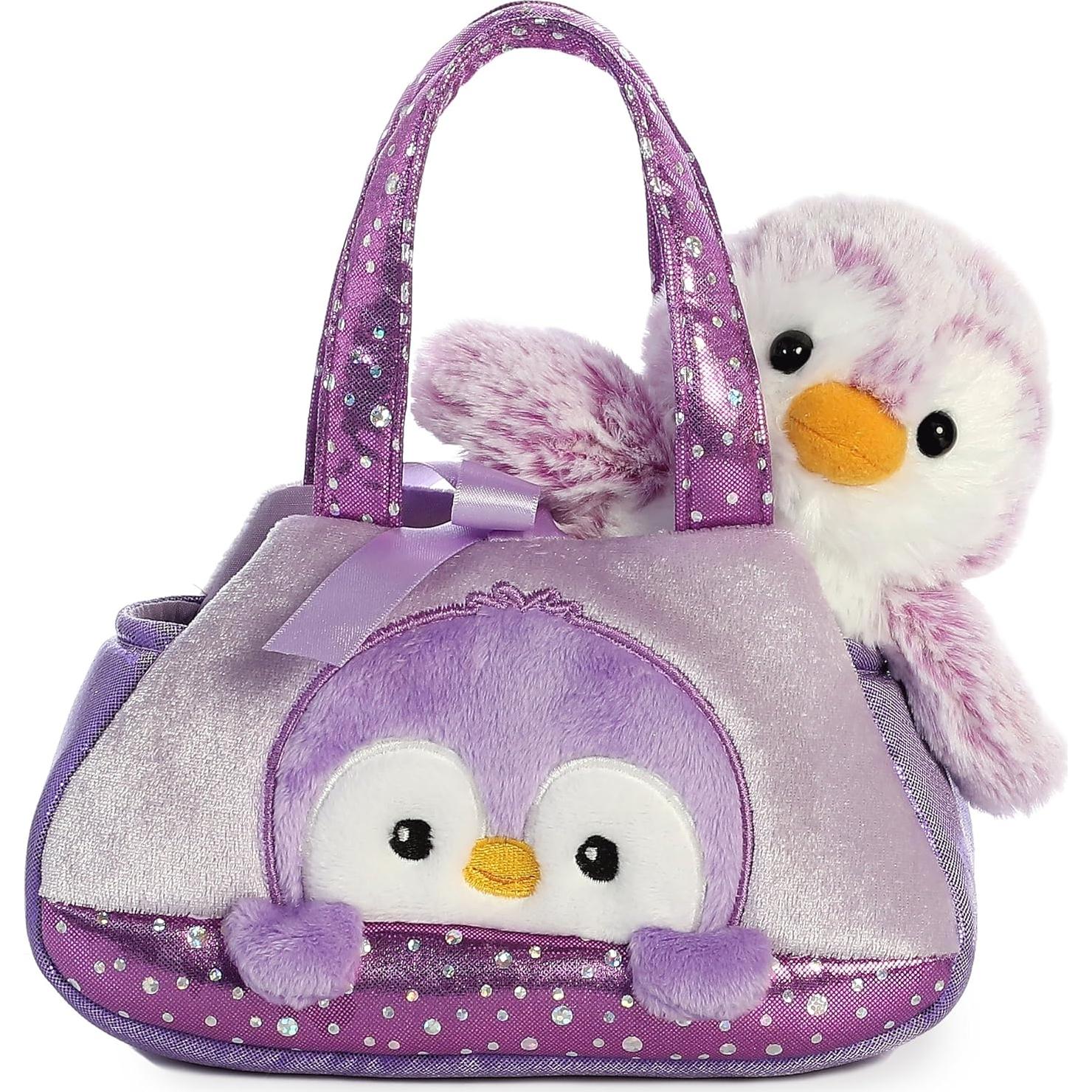 Peluche Pingüino Pom Pom Aurora 17.78 cm - Accesorio de Viaje