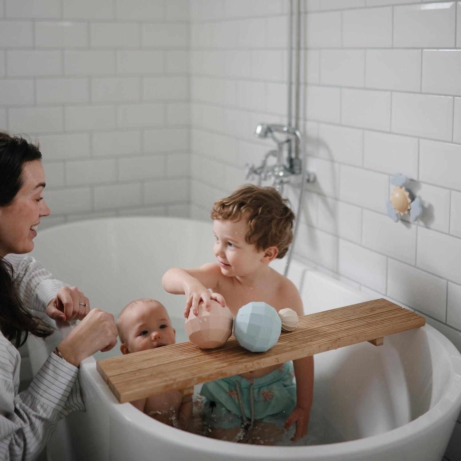 Juguete Sensorial Esferas Anidadas Mushie Rosa - 3 Piezas