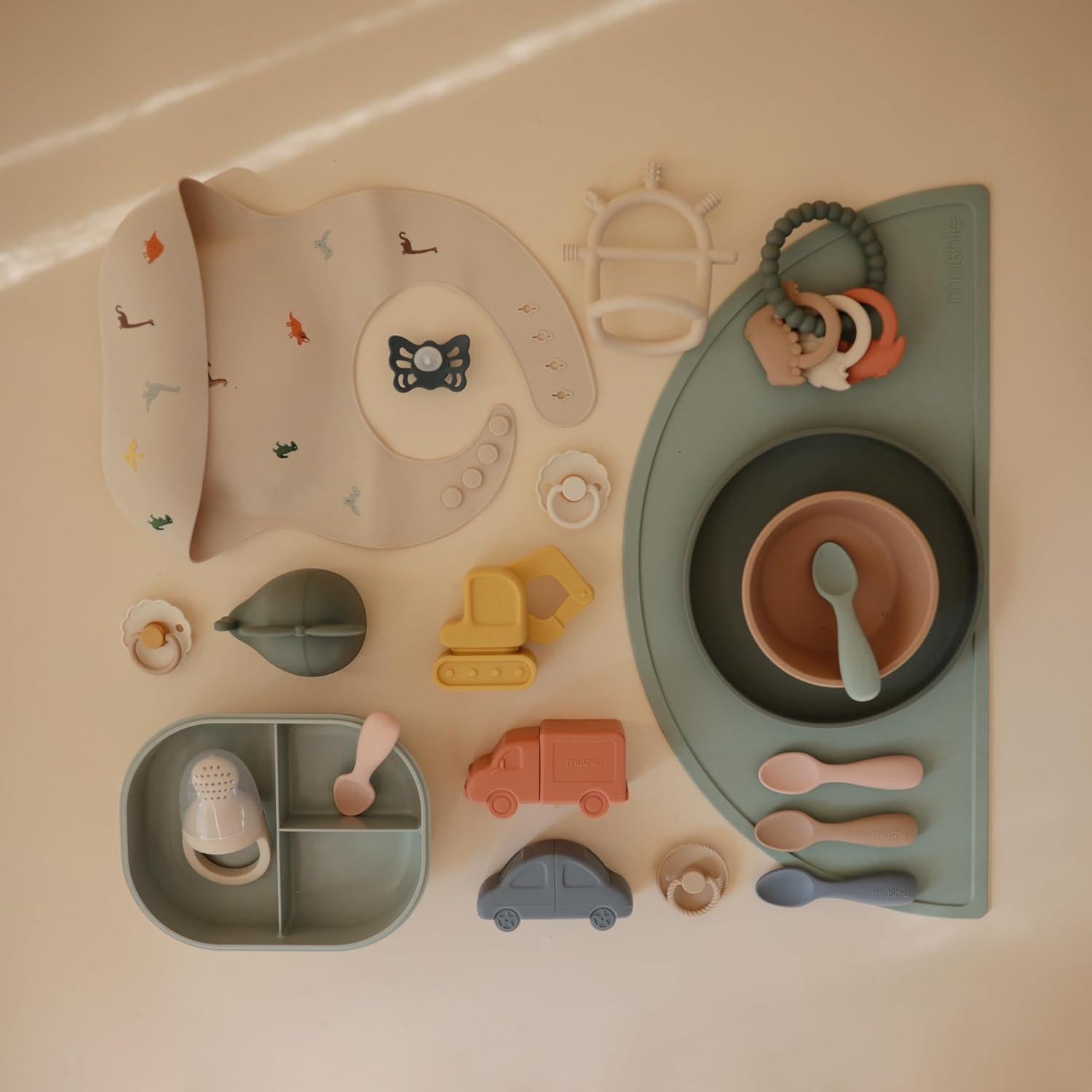 Anillo de Dentición Mushie Dino de Silicona 100% Seguro