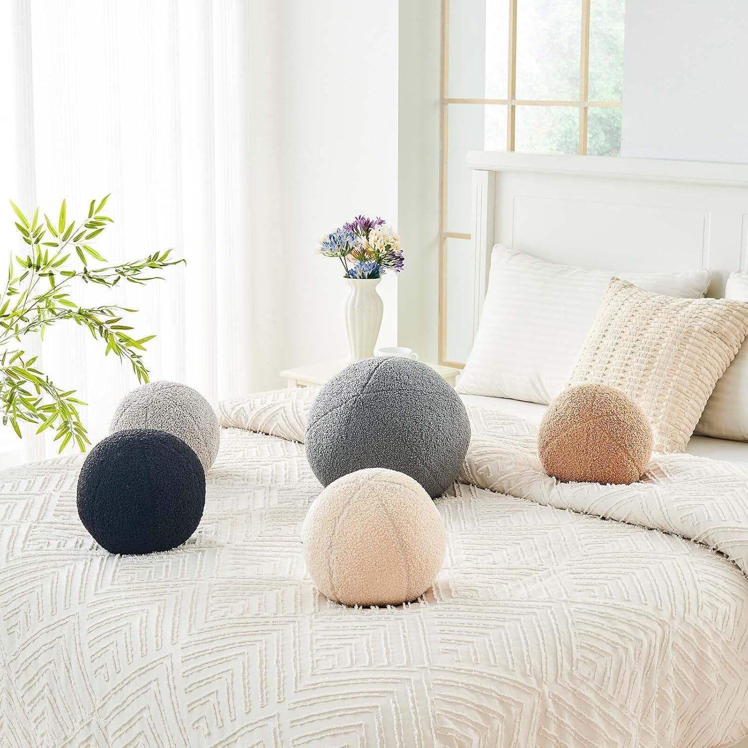 Cojín decorativo redondo Uvvyui 21.8 cm beige suave