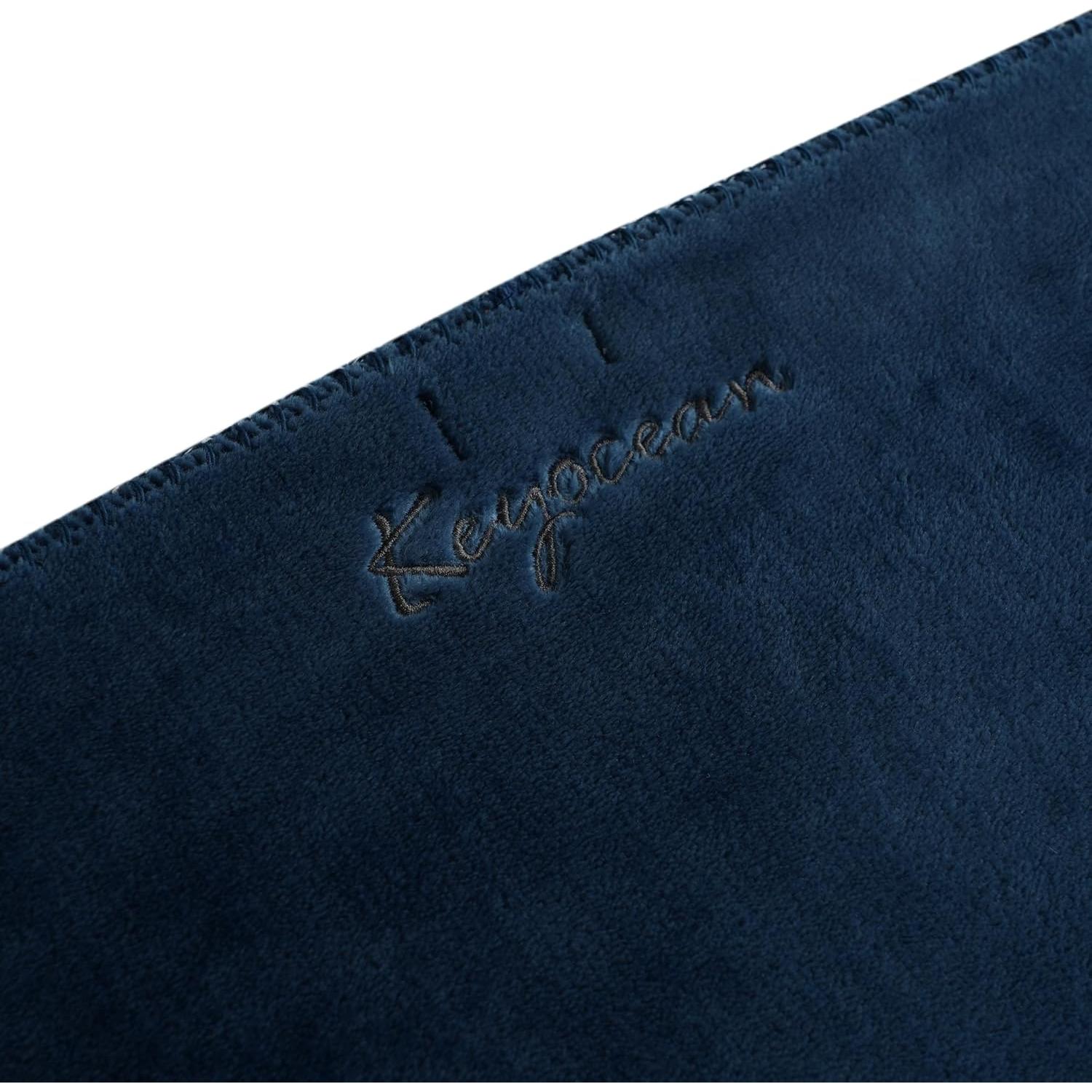 Chal de forro polar Keyocean azul con 2 bolsillos grandes