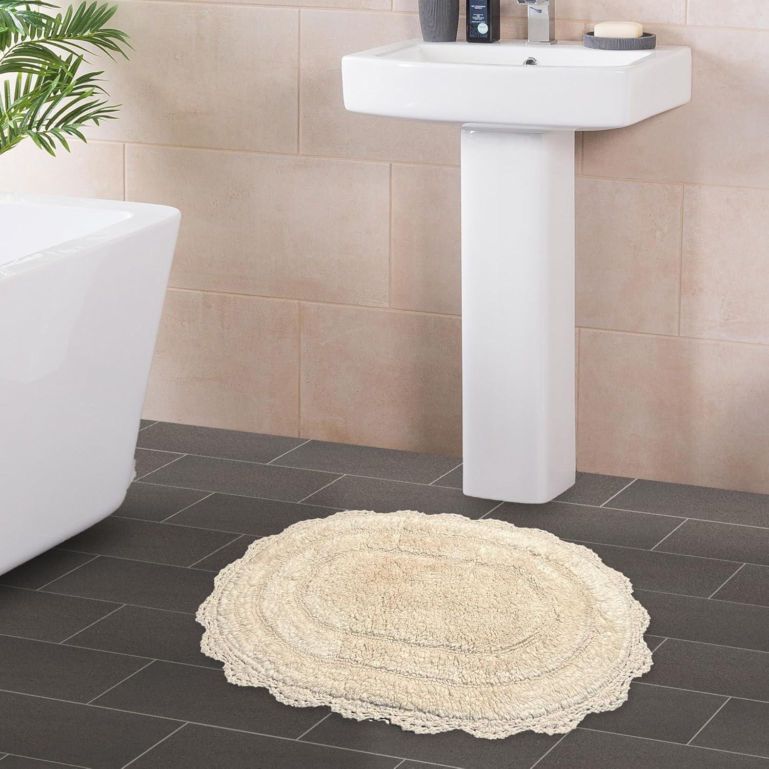 Alfombra de baño ovalada Chardin Home 100% algodón marfil 43x61 cm