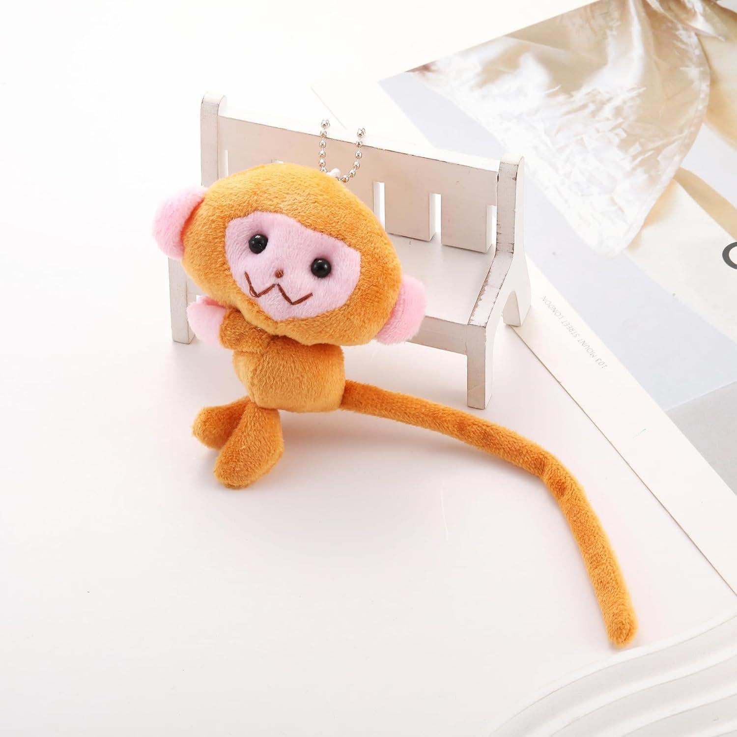 Llavero de Mono Kawaii de Peluche PUCAPOCO 15 cm Rosa/Marrón