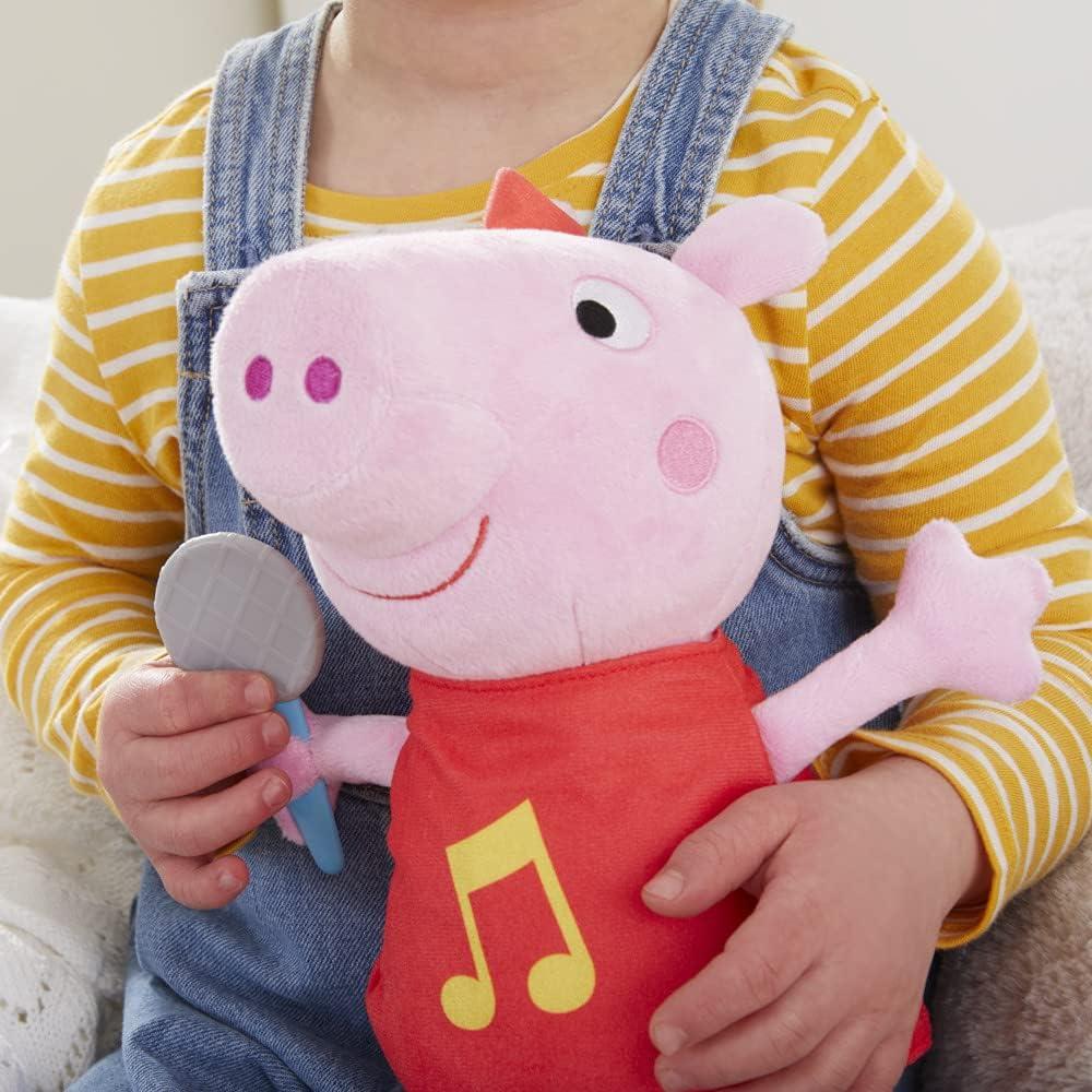 Peppa Pig Juguete de Peluche Cantante 28 cm con Vestido Rojo