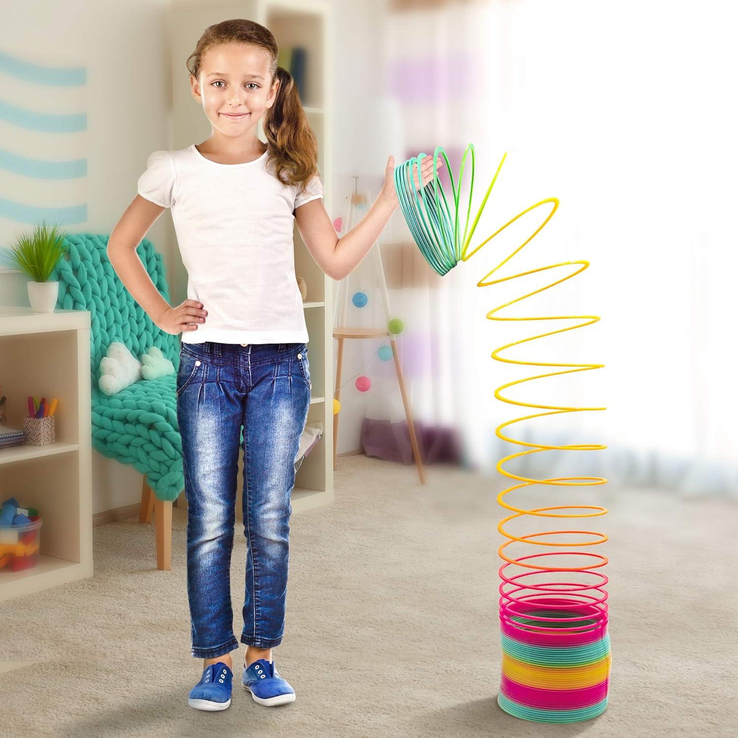 Juguete de resorte gigante Srenta arcoíris 15.24 cm para niños