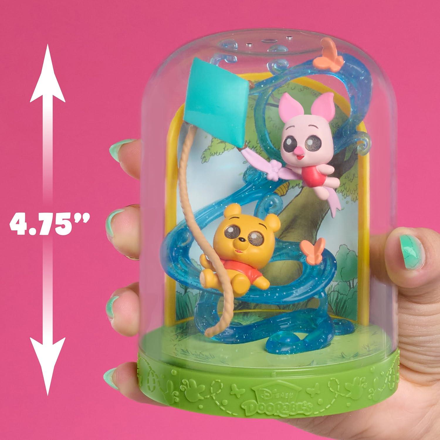 Disney Doorables Puerta a la Magia con 2 Figuras Coleccionables