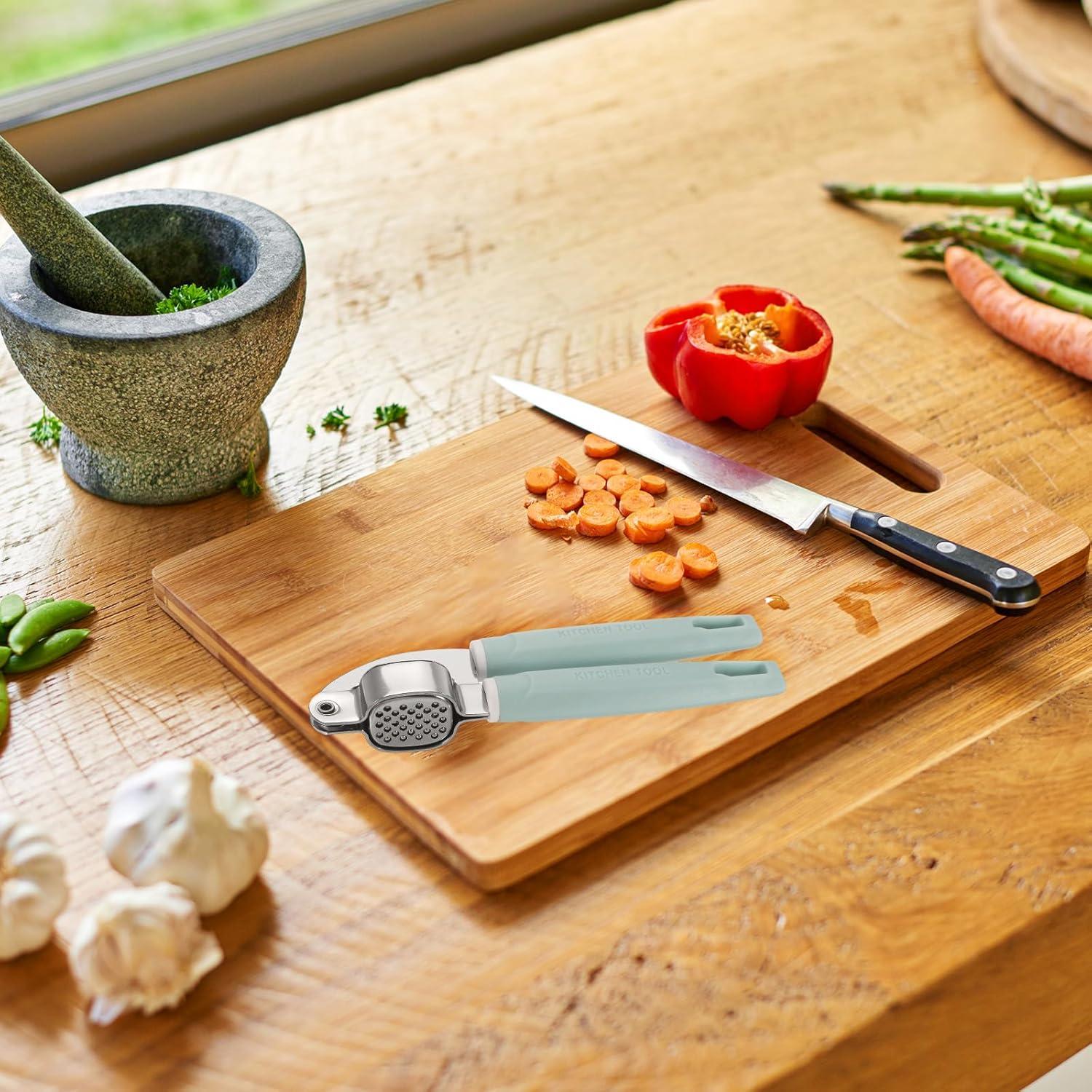 Prensa de Ajo uxcell 19.5 cm Acero Inoxidable Rosa