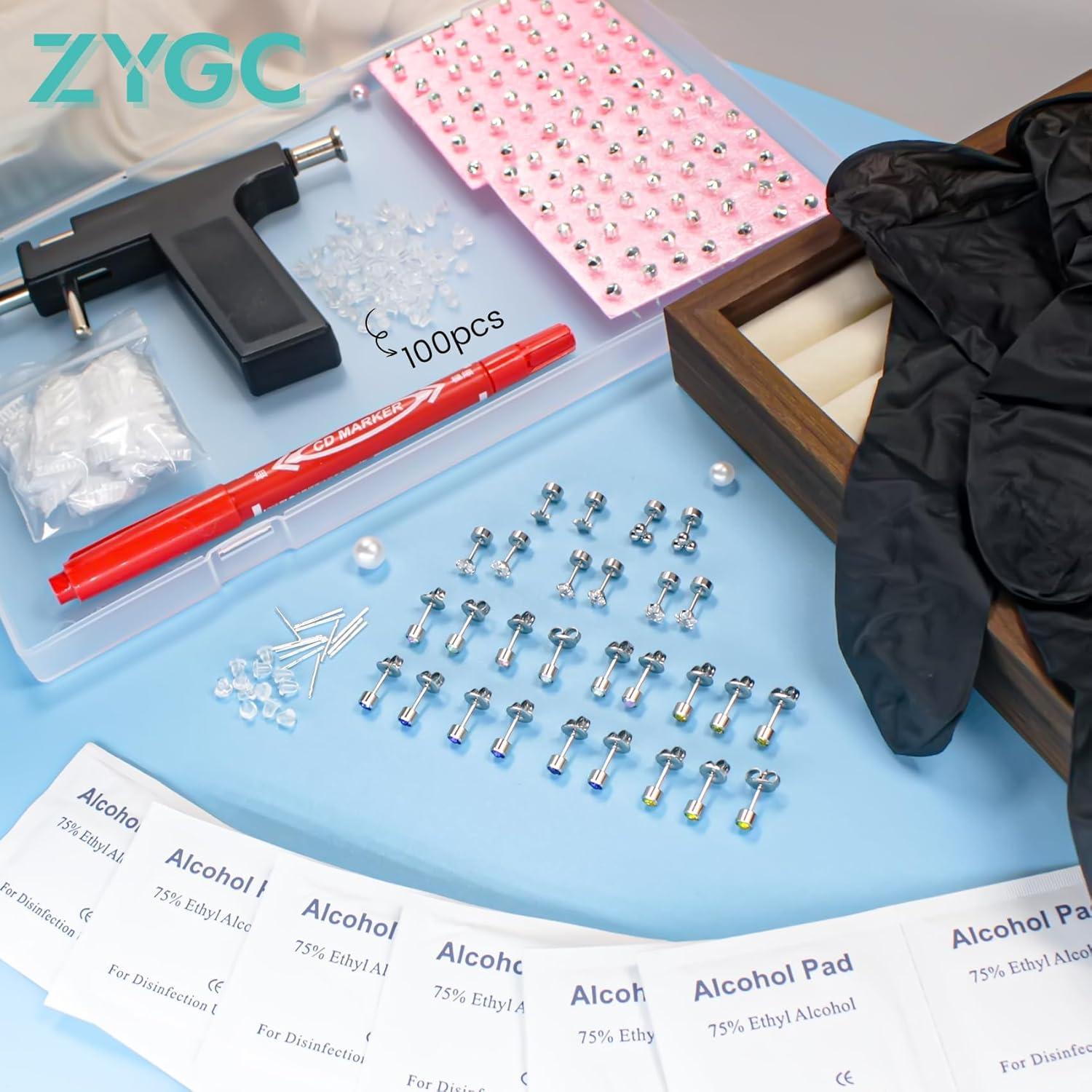 Kit de perforación de orejas Zygc con 63 aretes y pistola