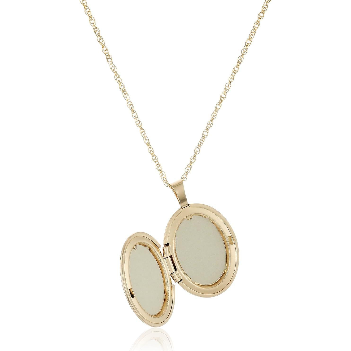 Colgante Ovalado de Oro 14k con Locket y Diamante 0.01 cttw