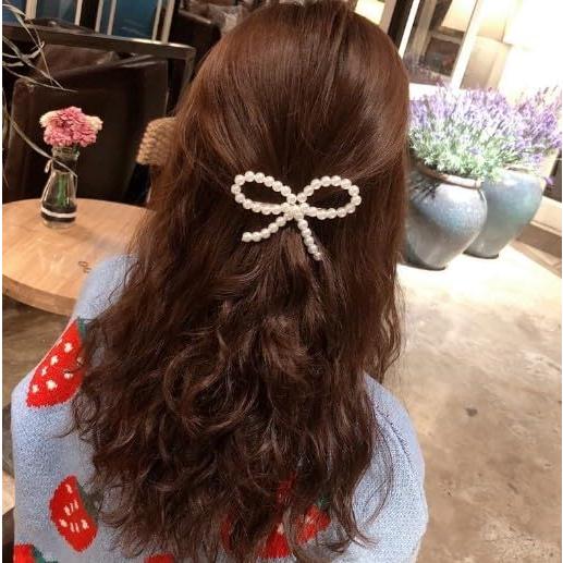 Clip de Pato Elegante Pluzmecalm con Lazo de Perla Blanca