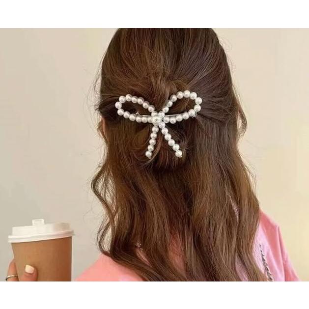 Clip de Pato Elegante Pluzmecalm con Lazo de Perla Blanca