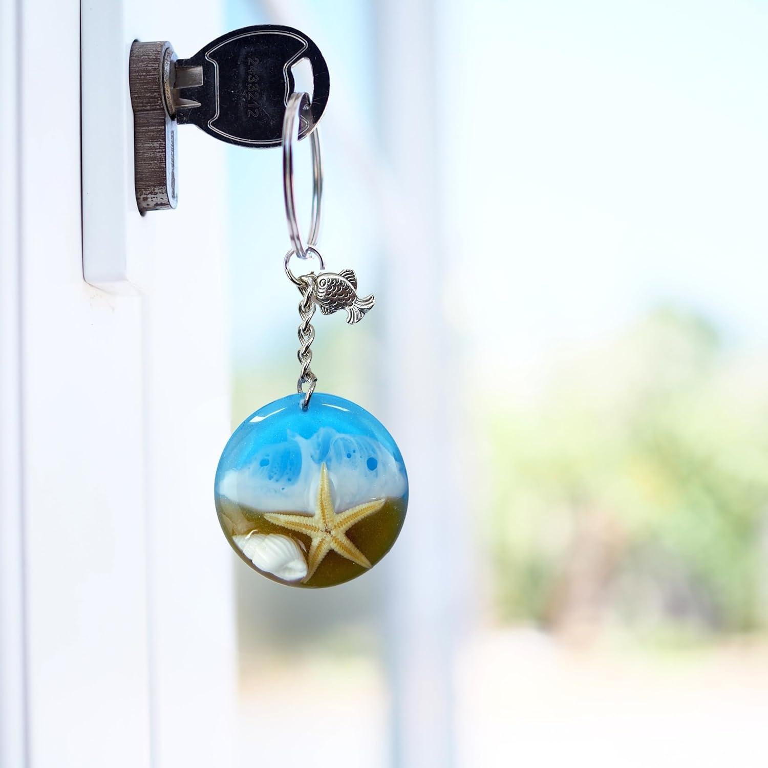 Llave de playa de resina con estrella de mar BAQDOVAVN